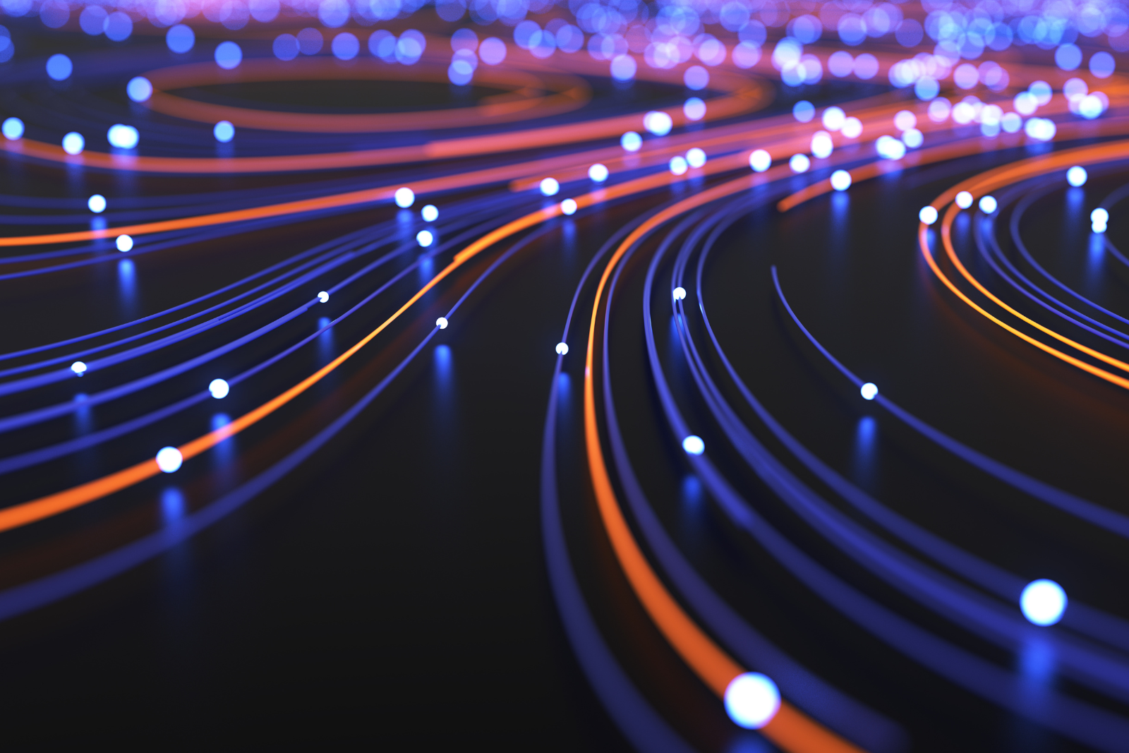 Photo of blurry highway streets with lights scattered across the roads