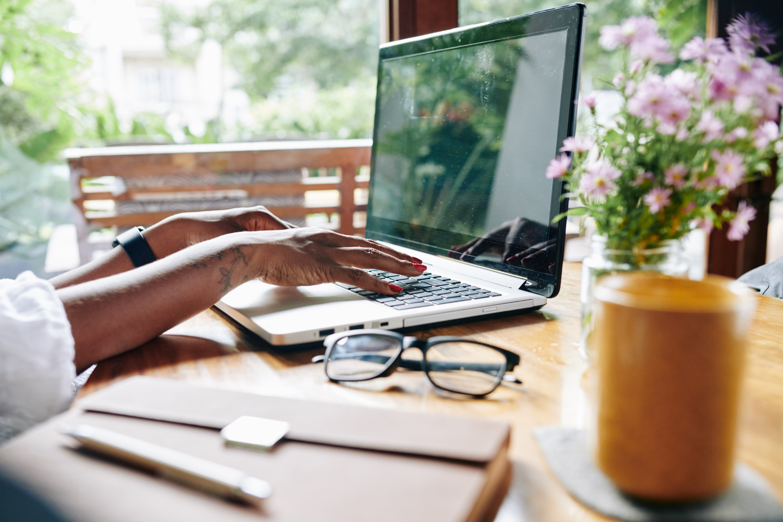 Image showing a woman typing on her laptop